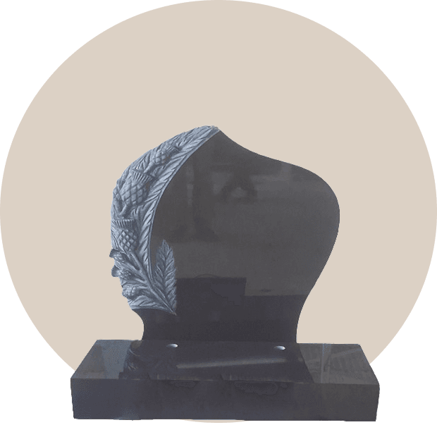 Polished Black Granite Headstone with Floral Carving